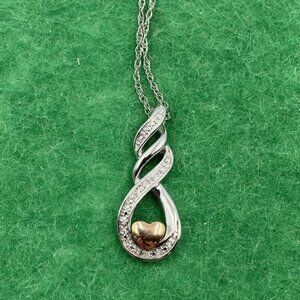 Brand New 10K Gold and Silver Heart Necklace For Sale